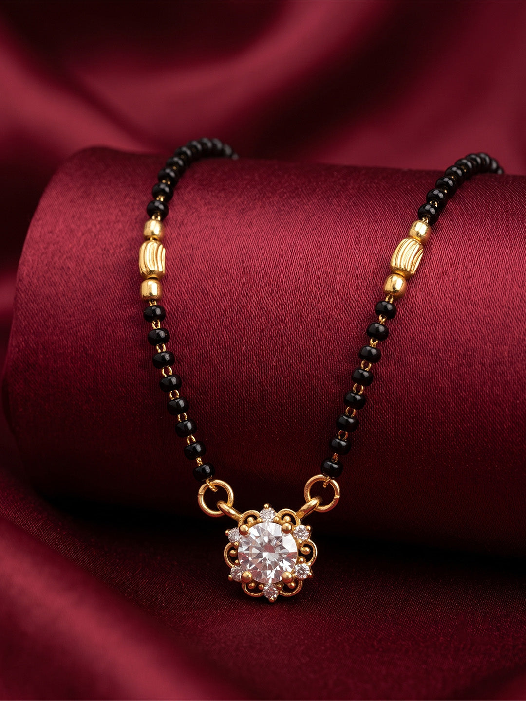 lfariya jewellery designer mangalsutra with a luxurious square gemstone pendant, polished gold finish and stylish black bead chain for everyday elegance