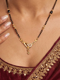 Lfariya Jewellery Golden Sparrow CZ Gold Plated Mangalsutra with bird-inspired pendant, black beads and sparkling cubic zirconia for women.