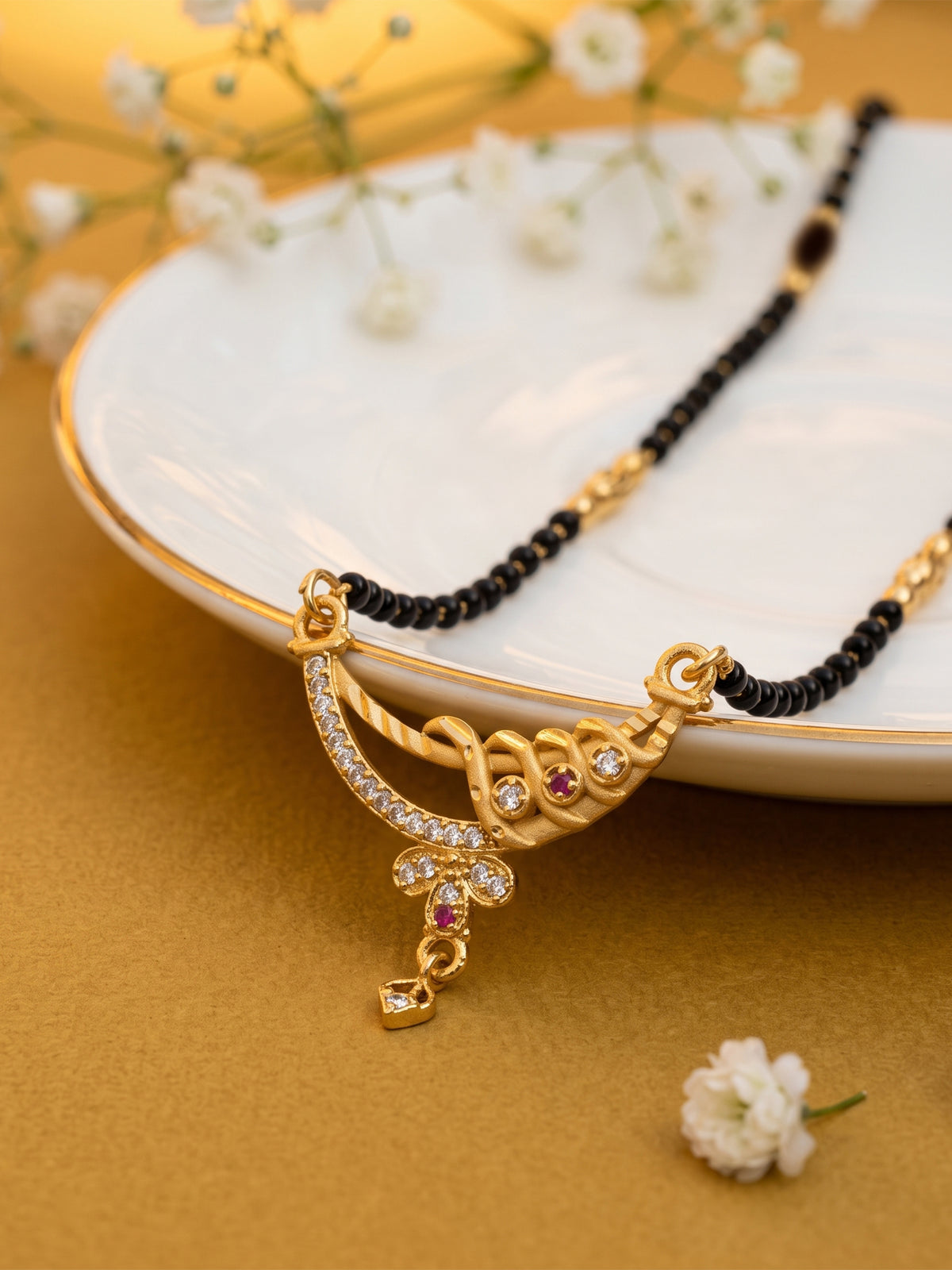 lfariya jewellery premium gold plated black bead mangalsutra necklace with a luxurious square red gemstone pendant, shimmering crystal detailing, timeless traditional style for modern women and special occasions.