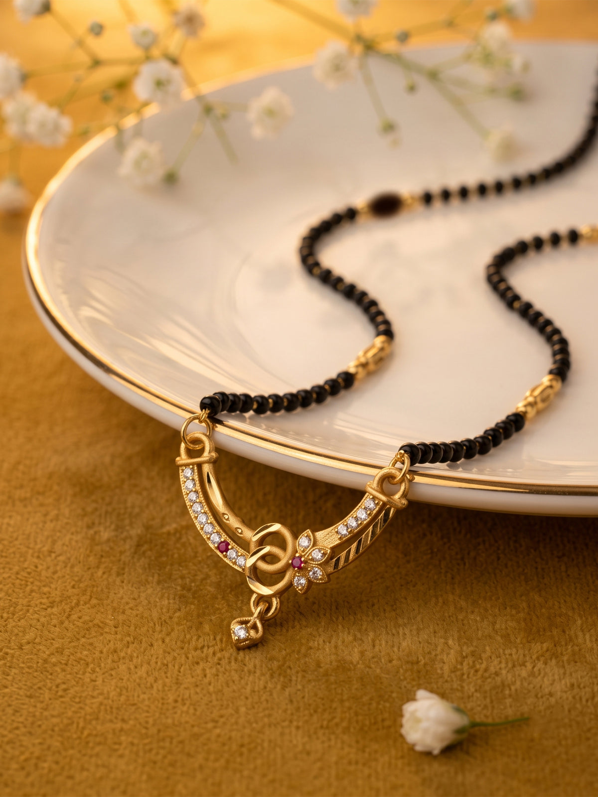 lfariya jewellery exclusive jewelry collection featuring a refined gold plated mangalsutra with square gemstone pendant, luxurious finish and timeless black bead craftsmanship for women.