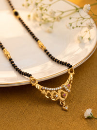 lfariya jewellery elegant gold plated mangalsutra with a geometric square pendant, radiant red gemstone centerpiece, sparkling crystal border and classic black bead chain for everyday elegance.