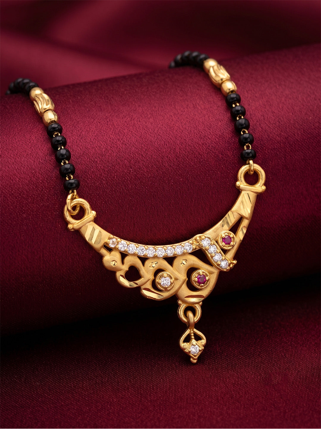 lfariya jewellery stylish mangalsutra necklace with a square red stone pendant, polished gold plated finish, premium black bead chain and sophisticated design for weddings, festivals and daily wear.