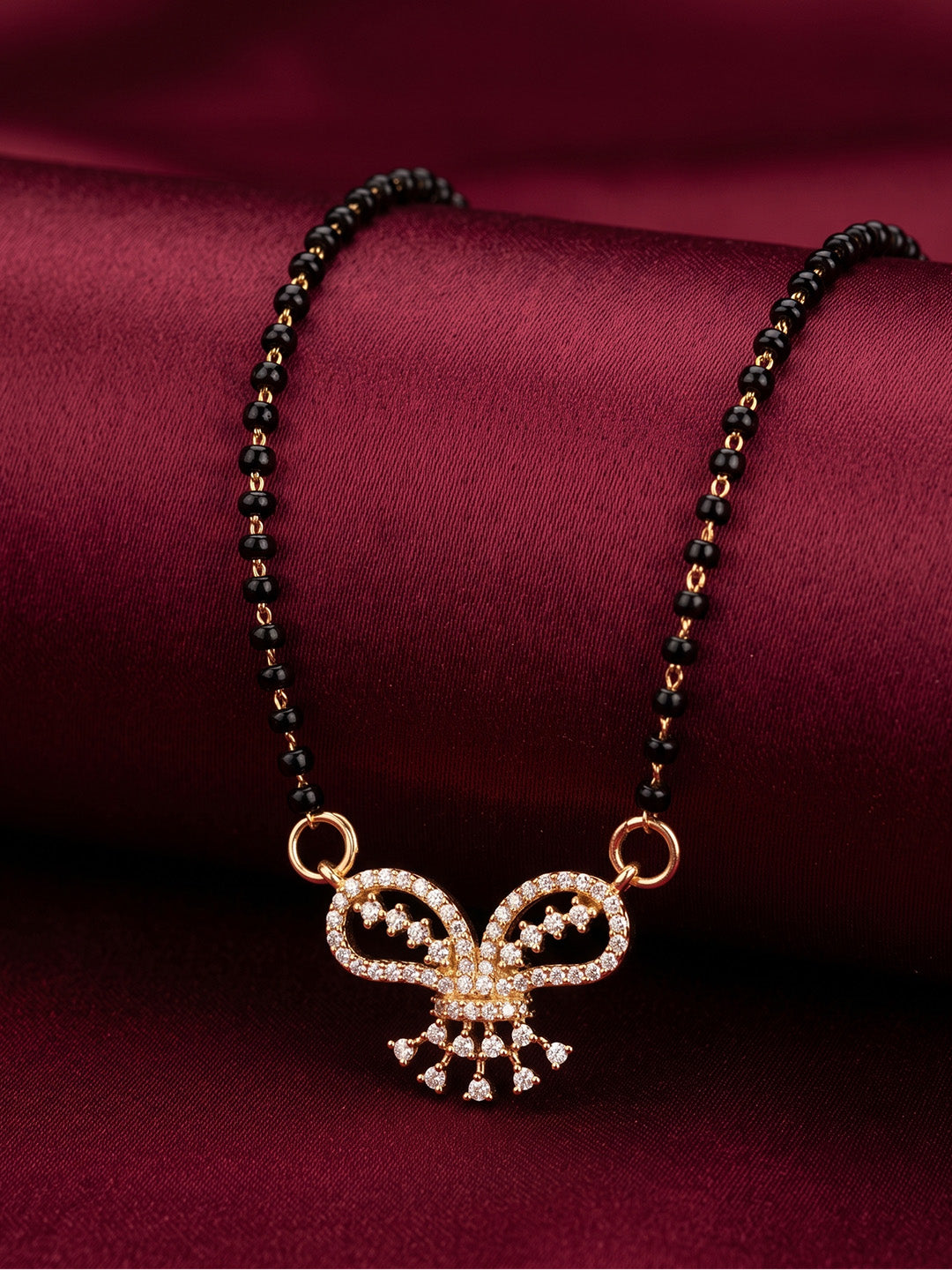 lfariya jewellery luxury mangalsutra necklace with a radiant square red gemstone pendant, sparkling crystal halo, gold plated finish and premium black bead chain for women.