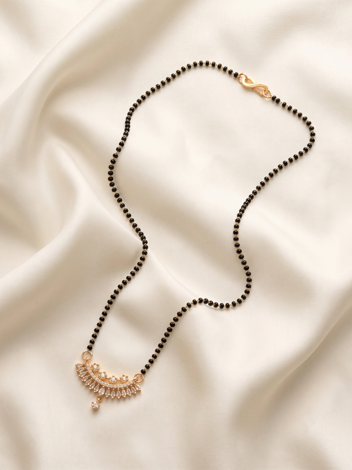 lfariya jewellery traditional black bead mangalsutra with a premium square gemstone pendant, polished gold plated finish and refined craftsmanship for modern Indian women.