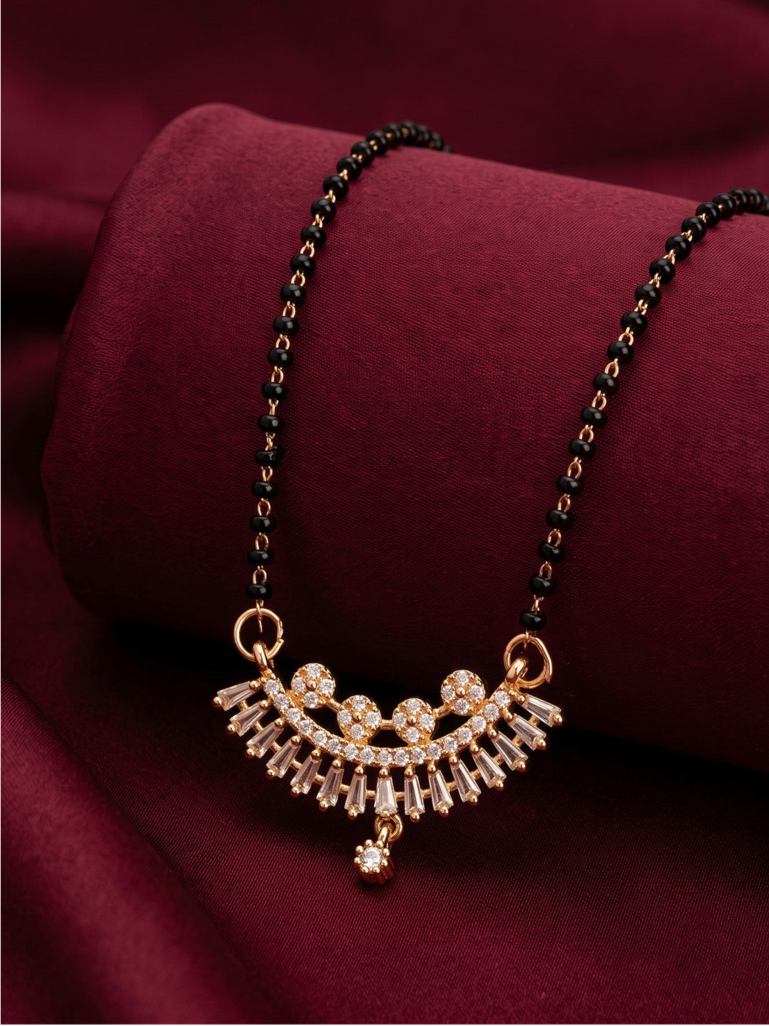 lfariya jewellery sophisticated gold plated mangalsutra with a square gemstone pendant, polished finish, premium black bead chain and elegant design suitable for every occasion.