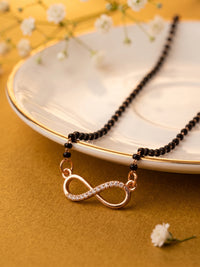 lfariya jewellery fashionable mangalsutra necklace featuring a square ruby gemstone pendant with a dazzling halo and premium gold plated finish