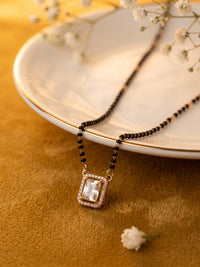 lfariya jewellery luxury gold plated mangalsutra necklace designed with a bold square ruby pendant and sparkling decorative stone accents
