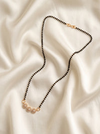lfariya jewellery premium ethnic mangalsutra necklace with gold plated finish, square gemstone pendant and elegant black bead chain, designed for weddings and special occasions.