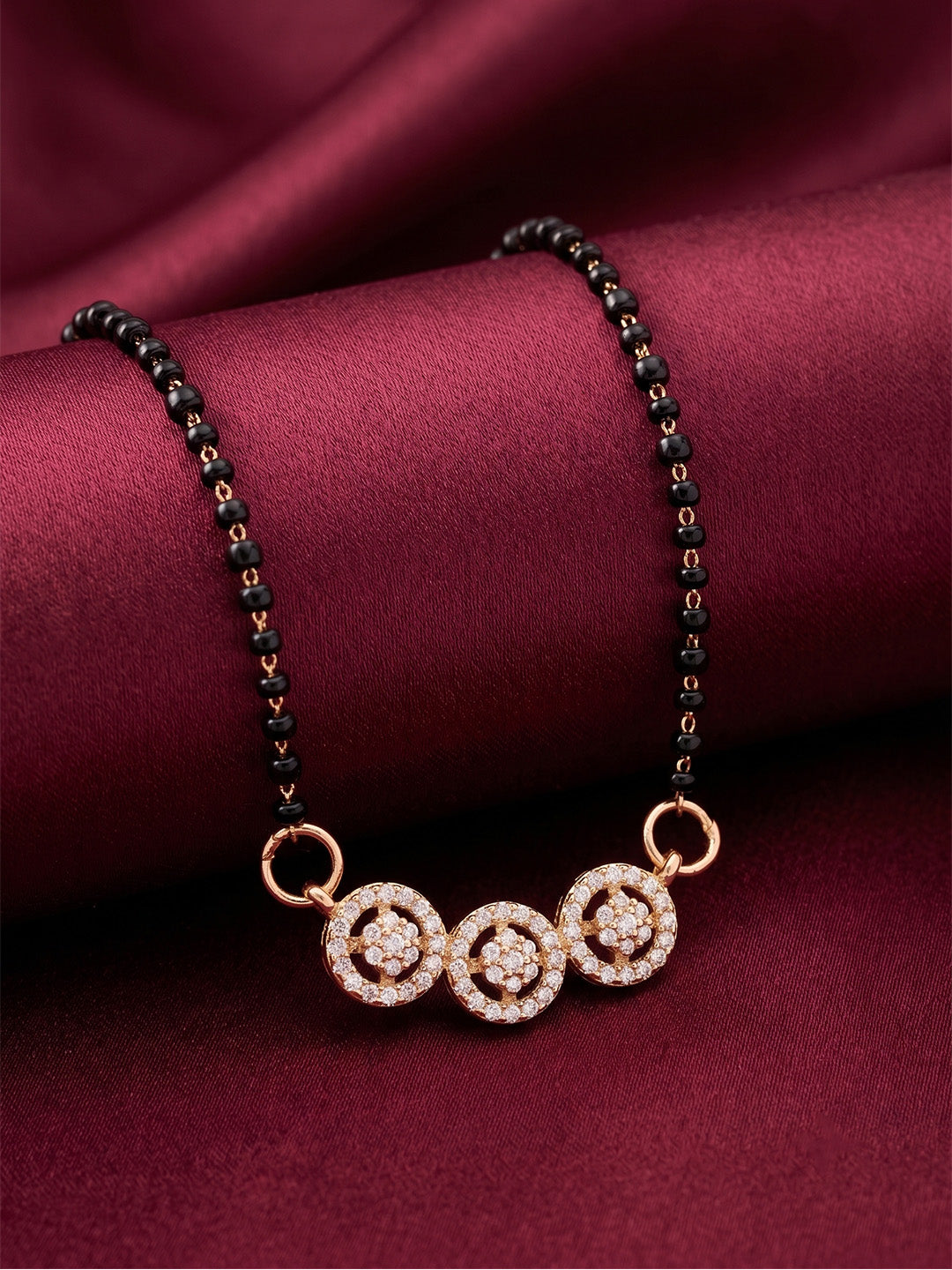 lfariya jewellery handcrafted gold plated mangalsutra necklace featuring a sparkling ruby pendant, polished finish, elegant black beads and premium craftsmanship for women
