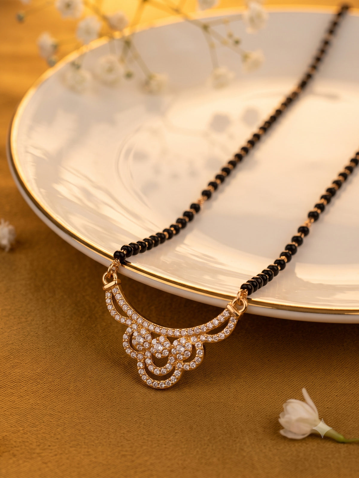 lfariya jewellery exclusive designer mangalsutra necklace with a bold ruby gemstone pendant, polished gold finish and graceful black bead chain for everyday and festive wear.