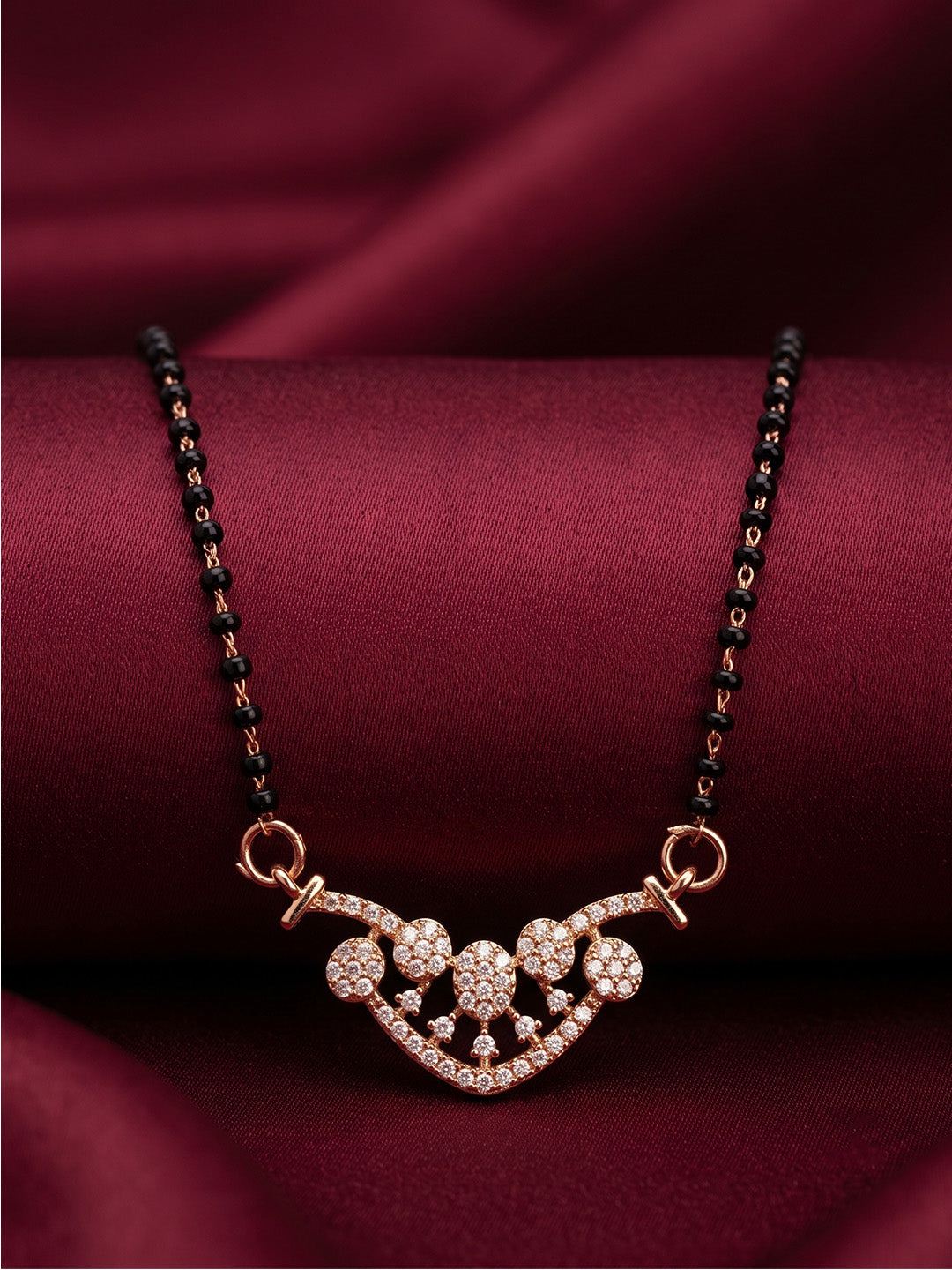 lfariya jewellery elegant black bead necklace with premium gold plated pendant, sparkling gemstone detailing and refined craftsmanship inspired by traditional Indian jewelry.