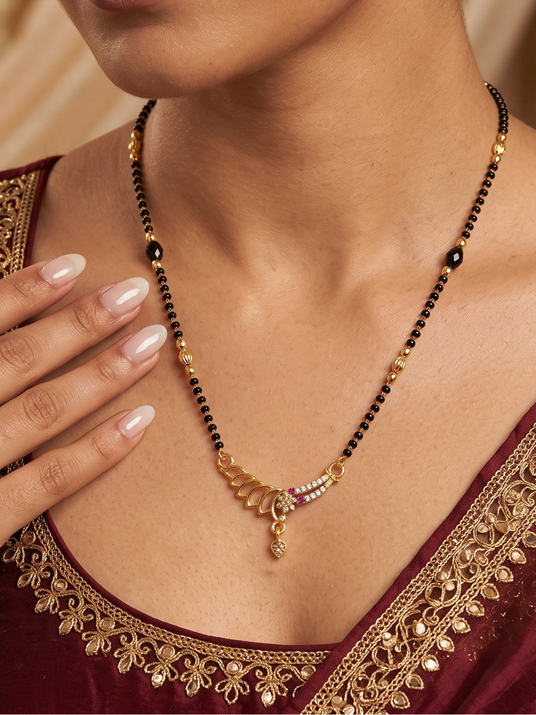 Royal Swan Curve CZ golden pendant black beads mangalsutra necklace for women with elegant designer finish