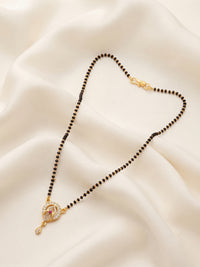 lfariya jewellery premium festive jewelry with a stylish square pendant, brilliant ruby stone, polished gold plated finish and traditional black bead chain perfect for gifting and celebrations.