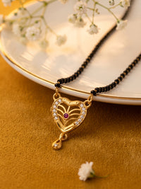 lfariya jewellery Indian designer mangalsutra featuring a beautiful square red stone pendant, gold plated finish and classic black bead chain for women.