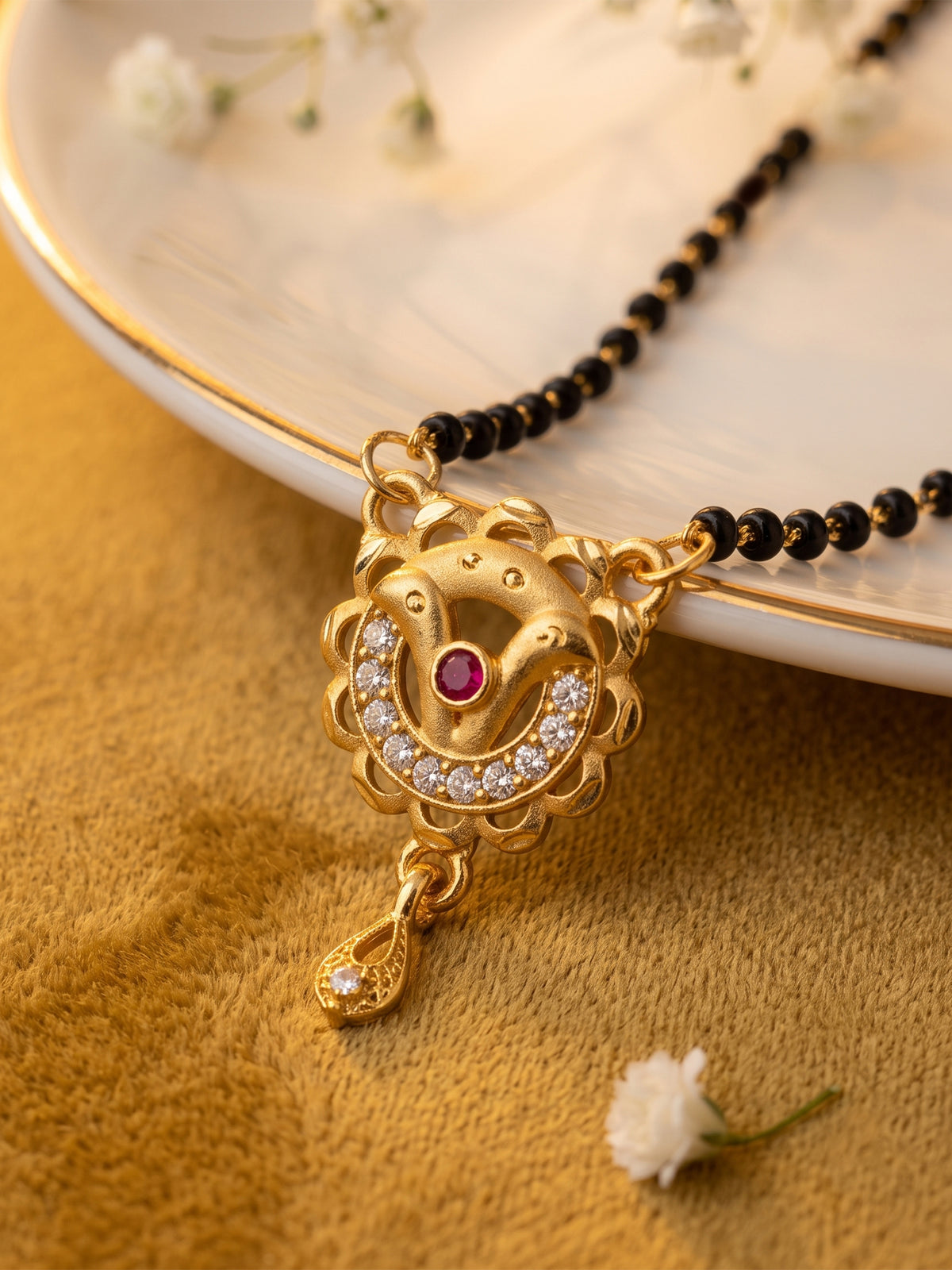 lfariya jewellery beautifully crafted Indian mangalsutra featuring a geometric square pendant, polished gold plated finish and classic black bead chain for ethnic and festive styling.