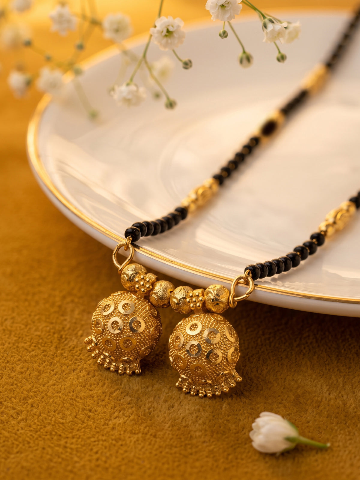 lfariya jewellery handcrafted vati mangalsutra with elegant gold plated finish and timeless black bead chain design.
