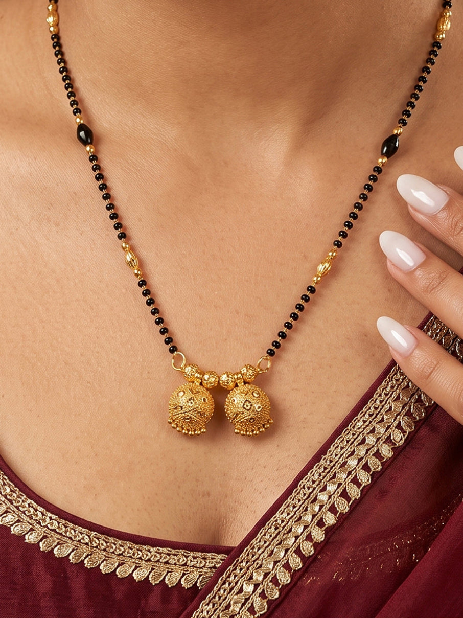 Traditional Double Vati Mangalsutra with black beads chain and textured gold vati pendant for women by Lfariya Jewellery.
