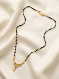 lfariya jewellery premium ethnic mangalsutra featuring a royal square red gemstone pendant, gold plated finish and handcrafted black bead chain for Indian women.