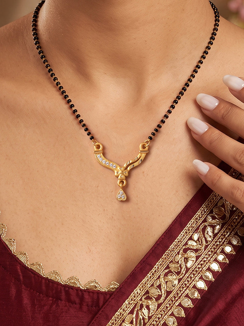 Swarna Rekha Curve Mangalsutra with CZ stones and teardrop pendant by Lfariya Jewellery for women.