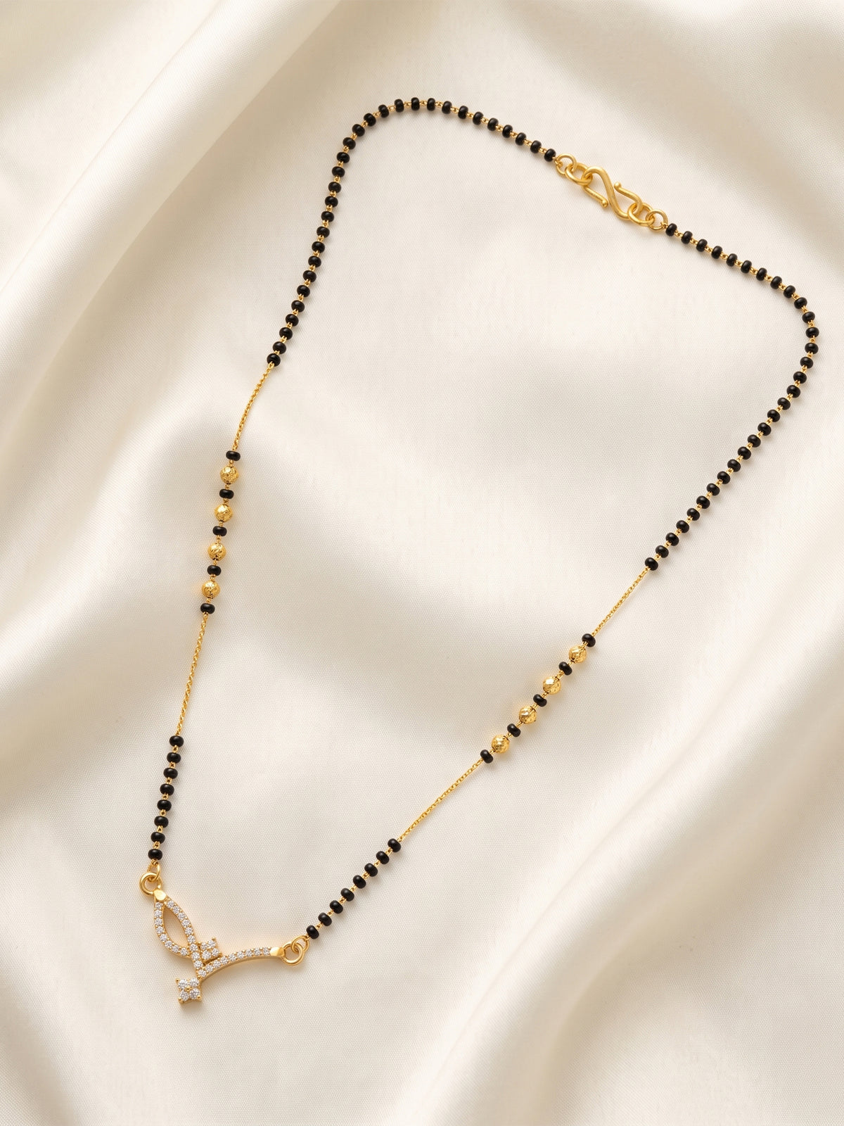 lfariya jewellery festive special gold plated mangalsutra featuring a vibrant ruby centerpiece, elegant square pendant and timeless Indian jewelry design.