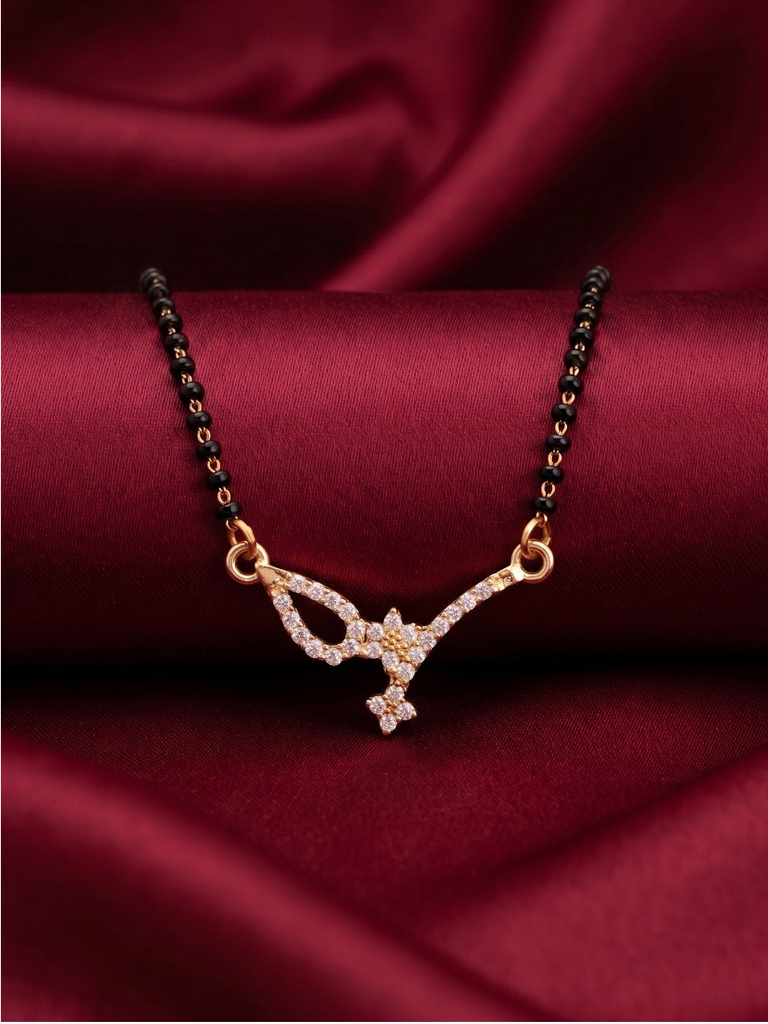 lfariya jewellery wedding collection mangalsutra with a sparkling square pendant, traditional black beads and premium gold plated finish for married women.