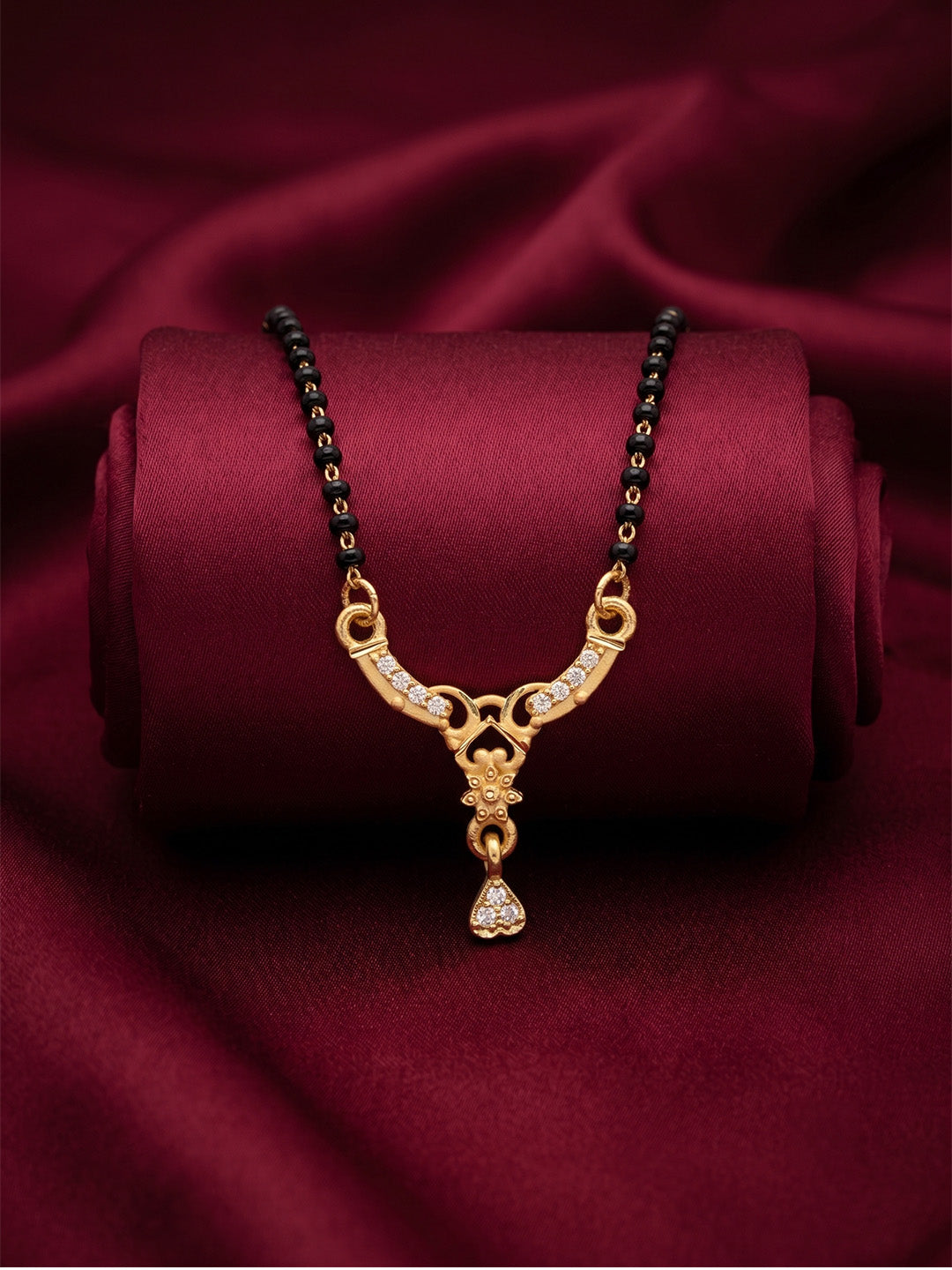 lfariya jewellery authentic Indian mangalsutra necklace with a royal square red gemstone pendant, polished gold plated finish and traditional black bead styling for women.