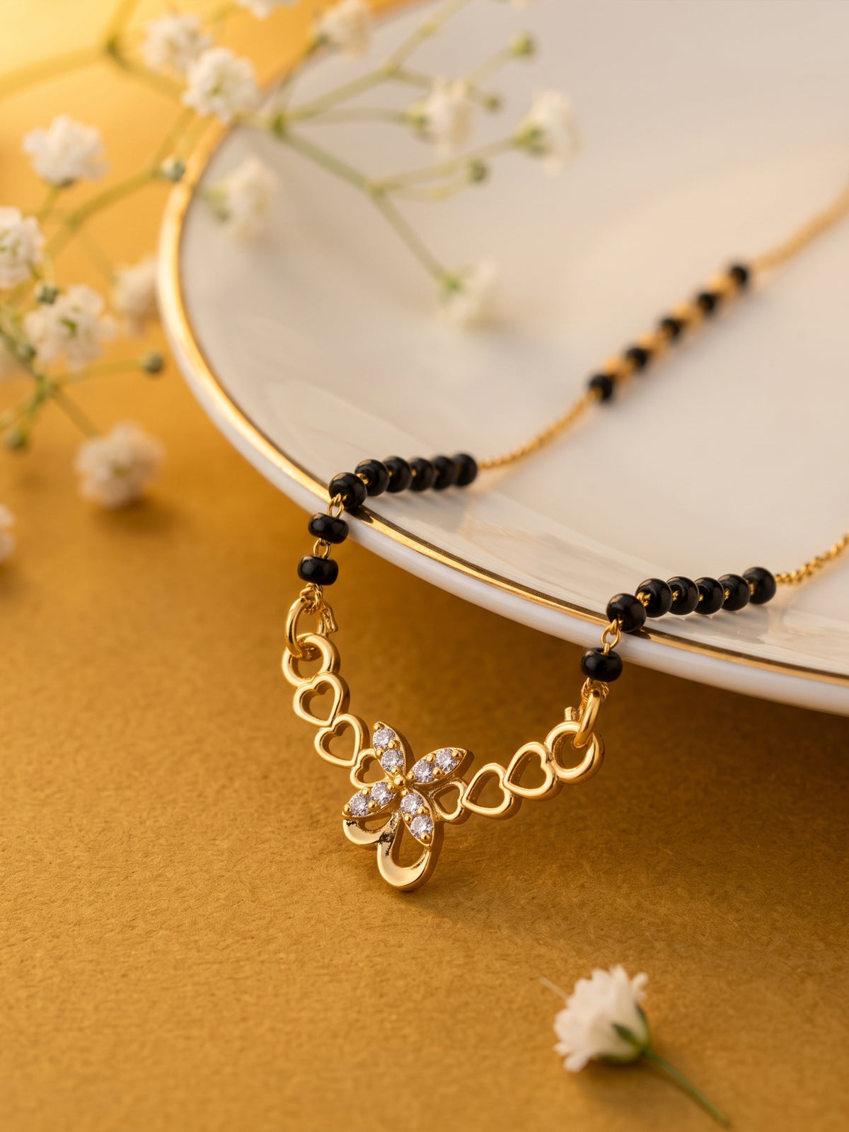 lfariya jewellery wedding special gold plated mangalsutra necklace with a timeless square ruby pendant, handcrafted black bead chain and elegant Indian jewelry design.