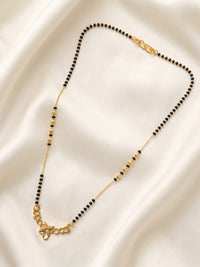 lfariya jewellery traditional black bead mangalsutra with a luxurious square pendant, radiant ruby stone and premium gold plated craftsmanship for women.