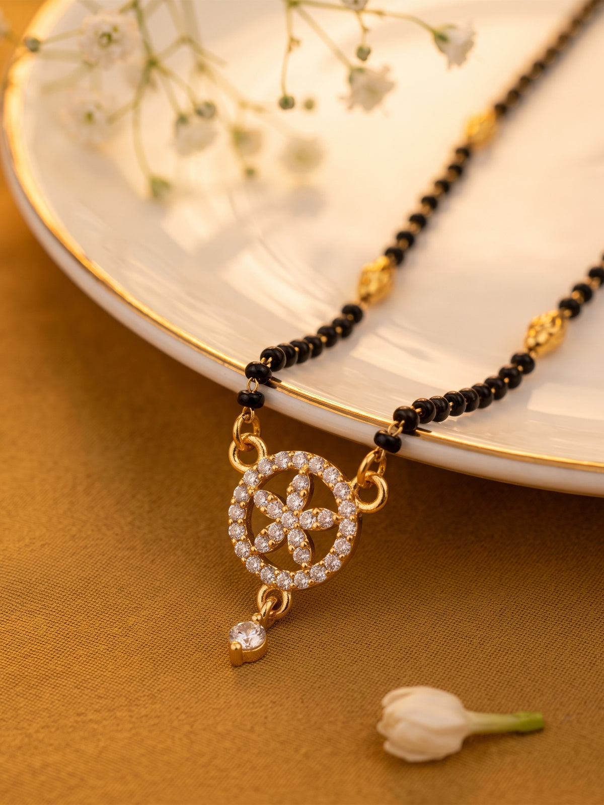 lfariya jewellery luxury gold plated designer mangalsutra for women with elegant American Diamond pendant and traditional black bead chain