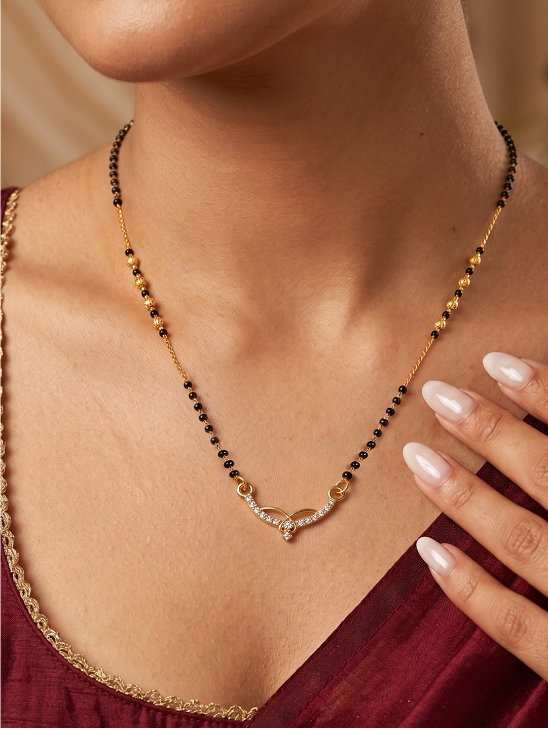 Elegant Infinity Grace Diamond Mangalsutra with black beads and sparkling CZ stone pendant by Lfariya Jewellery for married women.
