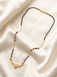 lfariya jewellery stylish women's mangalsutra necklace with a classic square pendant, brilliant red gemstone and traditional black bead chain for Indian weddings.