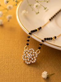 lfariya jewellery designer gold plated mangalsutra with a luxurious square red gemstone pendant, classic black bead chain and timeless Indian jewelry craftsmanship, ideal for bridal wear, ethnic outfits and celebrations.