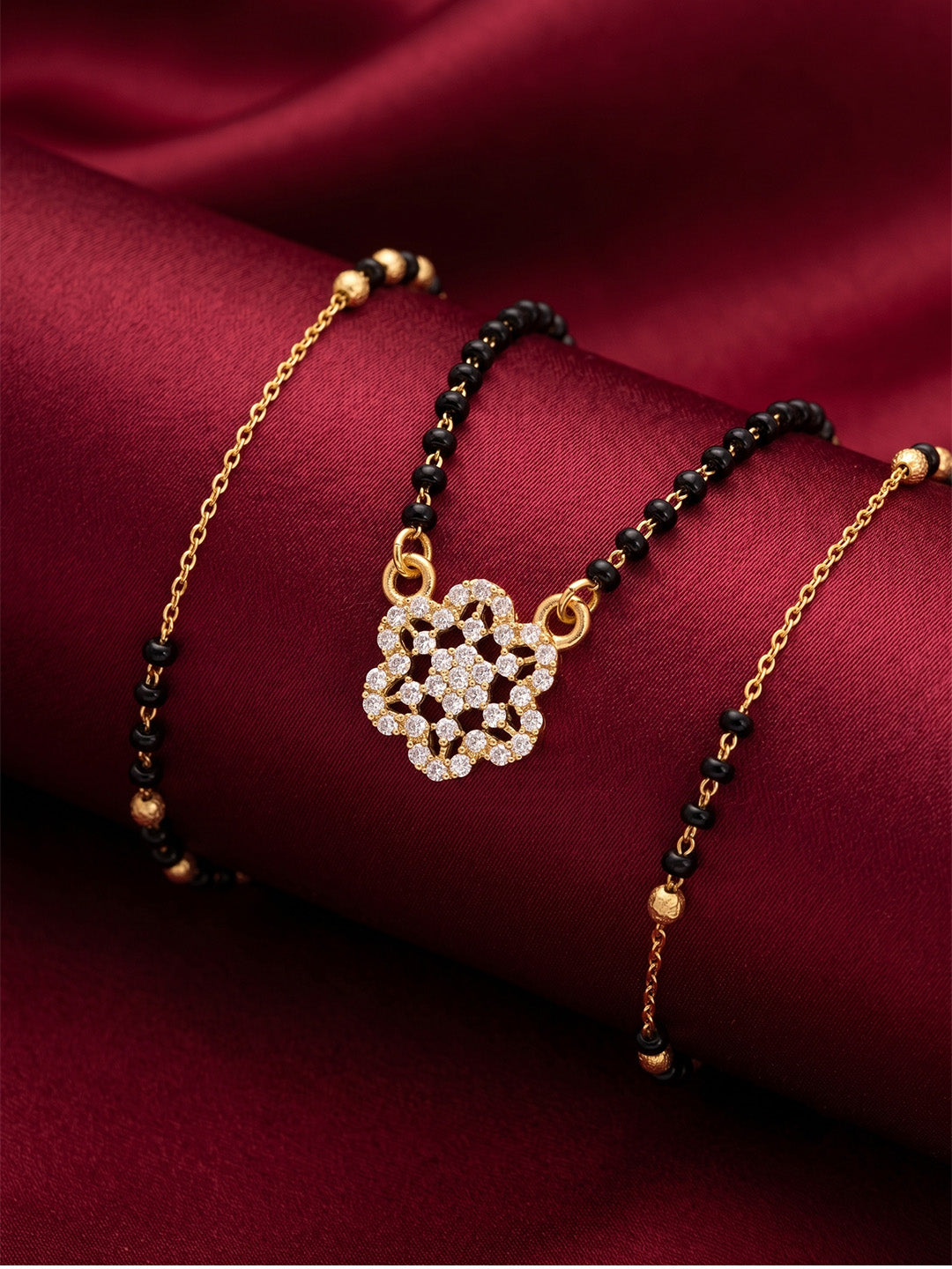 lfariya jewellery signature gold plated mangalsutra with a designer square ruby pendant, timeless black bead chain and elegant ethnic jewelry crafted for modern Indian women.