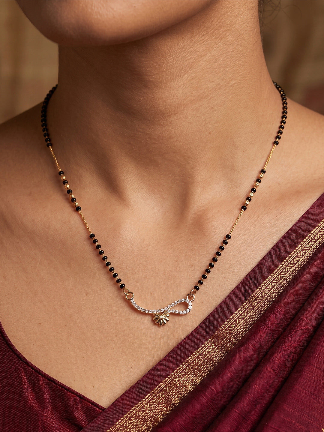 Lfariya Jewellery Infinity CZ Gold Plated Mangalsutra with Black Beads for Women