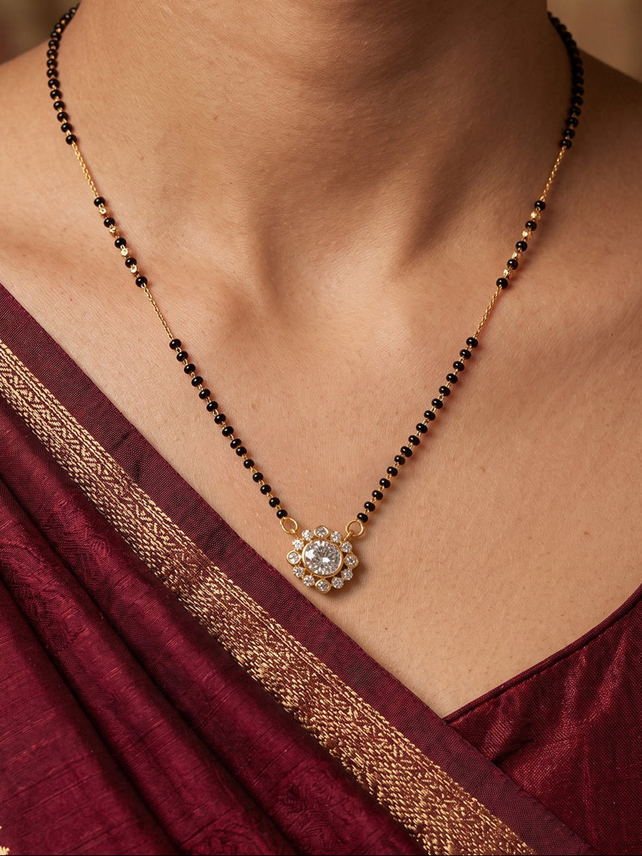 Lfariya Jewellery Sunflare Bloom CZ Gold Plated Mangalsutra with floral round pendant and black bead chain for women.